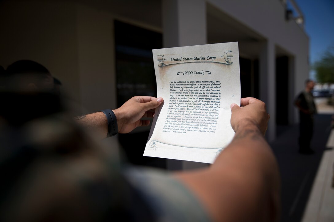 U.S. Marines assigned to Marine Corps Air Station (MCAS) Yuma Headquarters & Headquarters Squadron (H&HS) receive their blood stripes during a Blood Stripe Ceremony at MCAS Yuma Ariz., May 1, 2019. The blood stripe honors the blood that was shed by Marine officers and noncommissioned officers (NCO) during the Battle of Chapultepec in 1847. The blood stripes are worn on the trousers of NCOs Staff NCOs, and officers in remembrance of those who courageously fought in the battle. (U.S. Marine Corps photo by Lance Cpl. Joel Soriano)