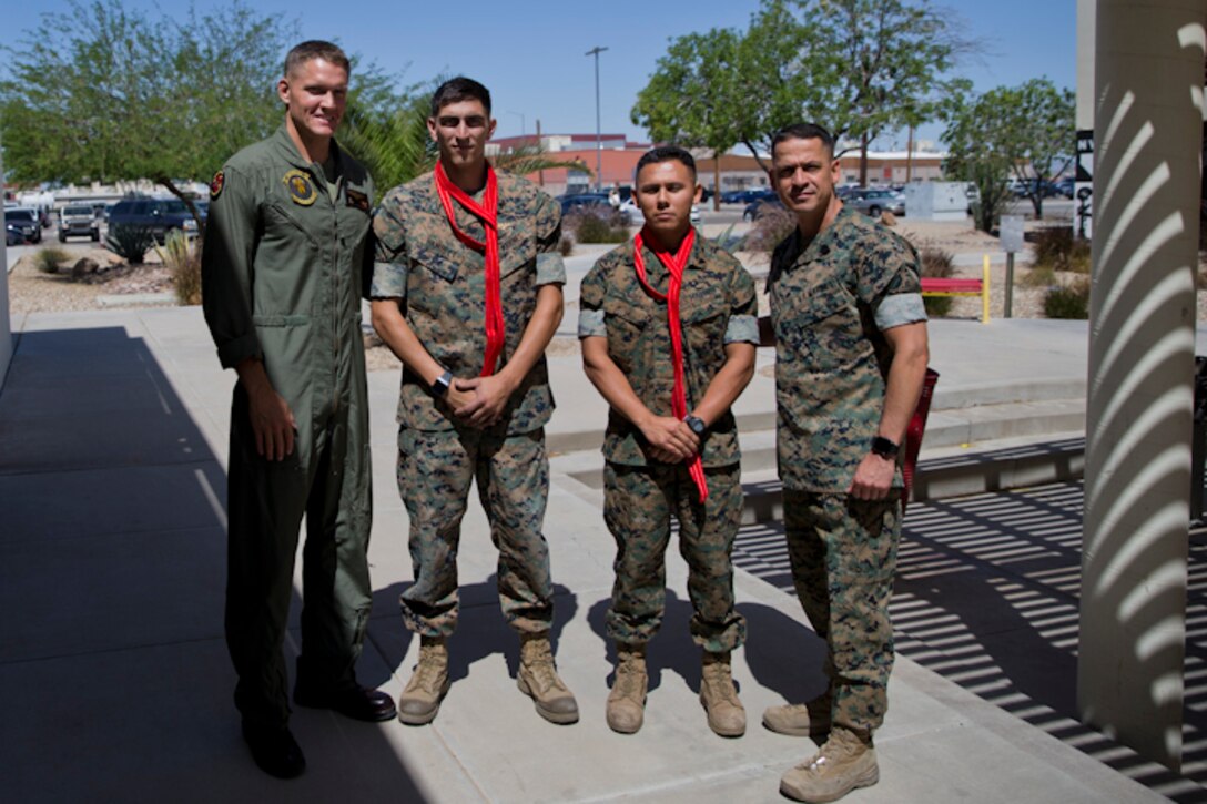 U.S. Marines assigned to Marine Corps Air Station (MCAS) Yuma Headquarters & Headquarters Squadron (H&HS) receive their blood stripes during a Blood Stripe Ceremony at MCAS Yuma Ariz., May 1, 2019. The blood stripe honors the blood that was shed by Marine officers and noncommissioned officers (NCO) during the Battle of Chapultepec in 1847. The blood stripes are worn on the trousers of NCOs Staff NCOs, and officers in remembrance of those who courageously fought in the battle. (U.S. Marine Corps photo by Lance Cpl. Joel Soriano)