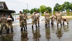 Illinois National Guard moves sandbags to construct levee