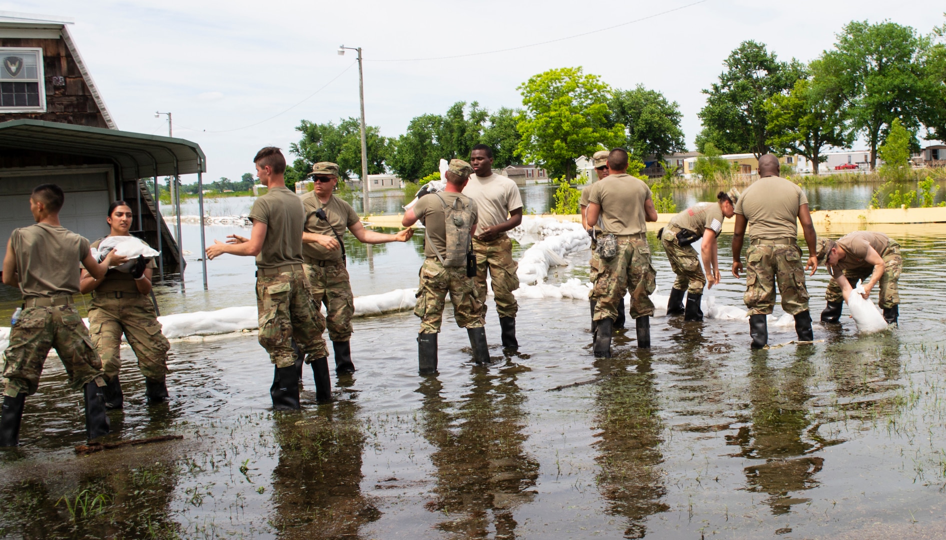 Illinois National Guard moves sandbags to construct levee
