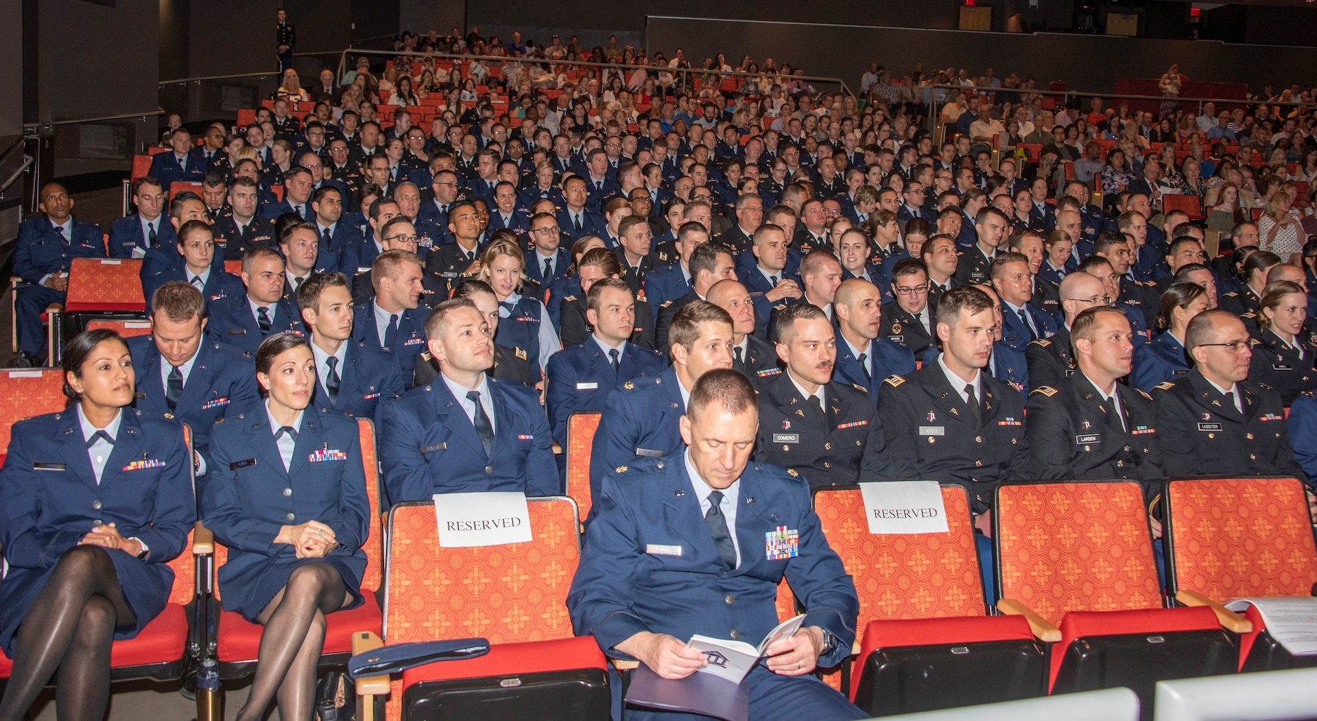 The 2019 San Antonio Uniformed Services Health Education Consortium graduates wait for the ceremony to begin at the Lila Cockrell Theatre in downtown San Antonio June 7. The ceremony honored 228 Army, Air Force, Navy, Public Health and civilian medical education and allied health graduates.