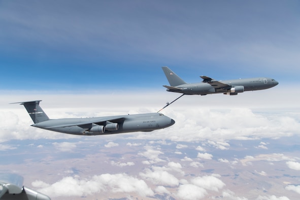 A KC-46A Pegasus out of Edwards Air Force Base, California, conducts testing with a C-5M Super Galaxy out of Travis Air Force Base, California, for the first time April 29, 2019. Travis will receive the KC-46, the Air Force’s newest refueling aircraft, in 2023. (U.S. Air Force photo by Christian Turner)