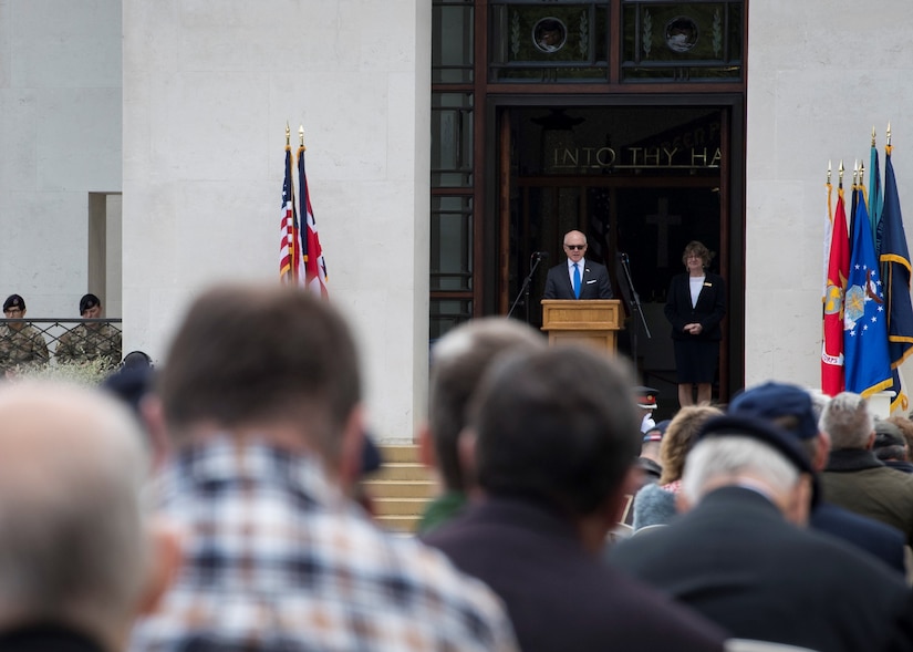 U.S. Ambassador to the U.K. Robert Wood Johnson gives a speech to remember the fallen during World War II as part of a Memorial Day ceremony at the Cambridge and Madingley American Cemetery in Cambridge, England, May 27, 2019. With the 75th anniversary of D-Day on June 6, Johnson highlighted some of the accomplishments that occurred during World War II and honored the individuals who perished. (U.S. Air Force photo by Senior Airman Jake Carter)