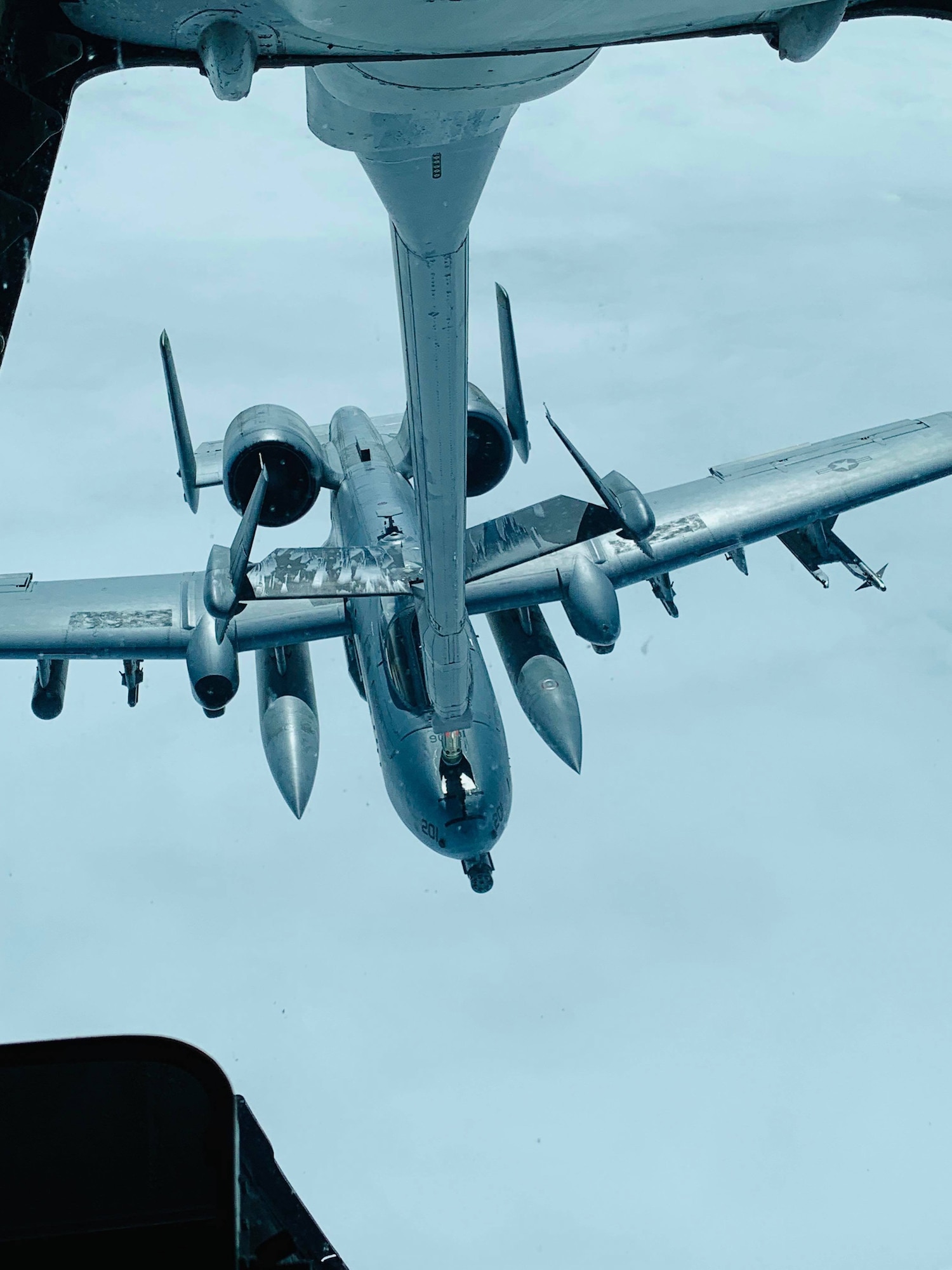 A U.S. Air Force A-10 Thunderbolt is refueled by a KC-10 Extender from Travis Air Force Base, California, over the Pacific Ocean. The Thunderbolt was on its way to participate in Red Flag Alaska 19-2, a large-scale exercise headquartered at Eielson Air Force Base, Alaska. The exercise began June 6 and is scheduled to continue through June 21. (U.S. Air Force courtesy photo)
