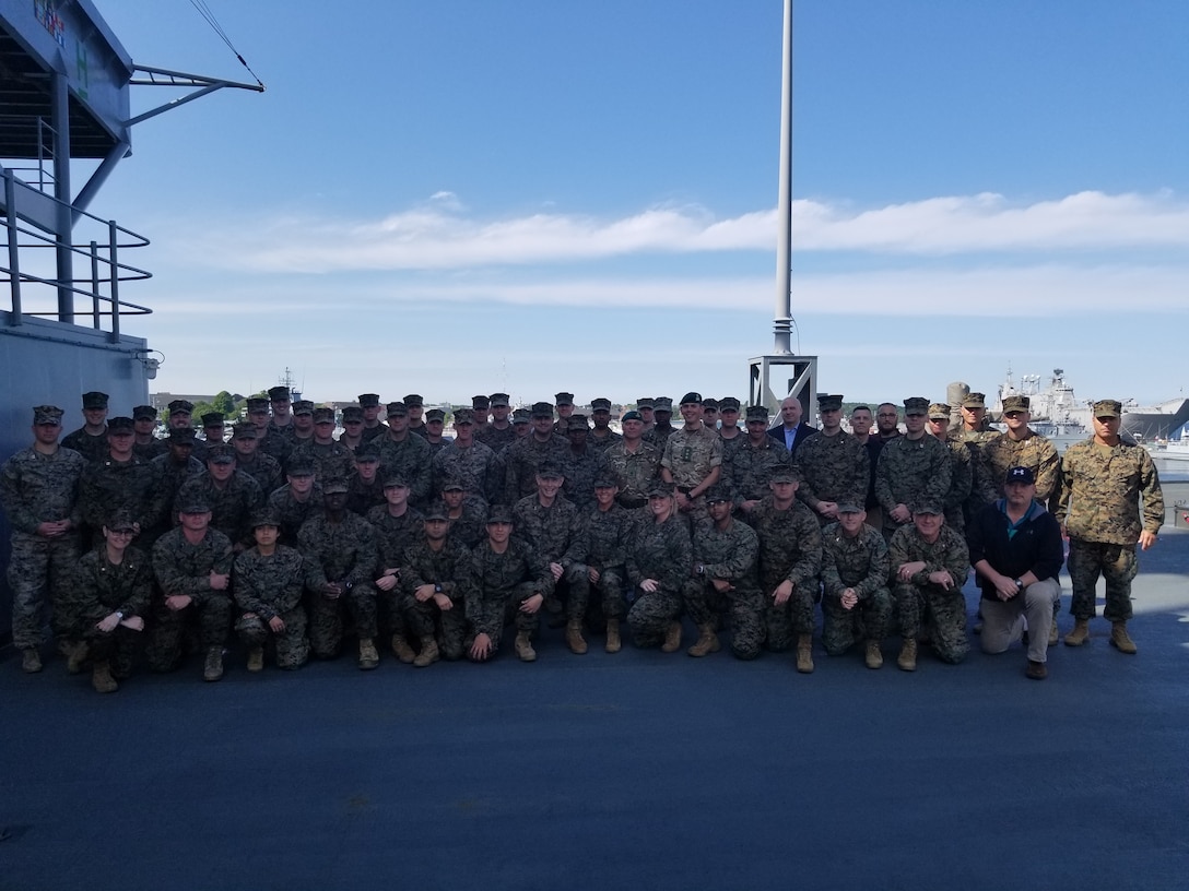 Members of 2nd Marine Expeditionary Brigade pose for a photo before the start of Exercise Baltic Operations 2019 aboard USS Mount Whitney June 7, 2019. BALTOPS is the premier annual maritime-focused exercise in the Baltic Region, marking the 47th year of one of the largest exercises in Northern Europe enhancing flexibility and interoperability among allied and partner nations. (Courtesy Photo)