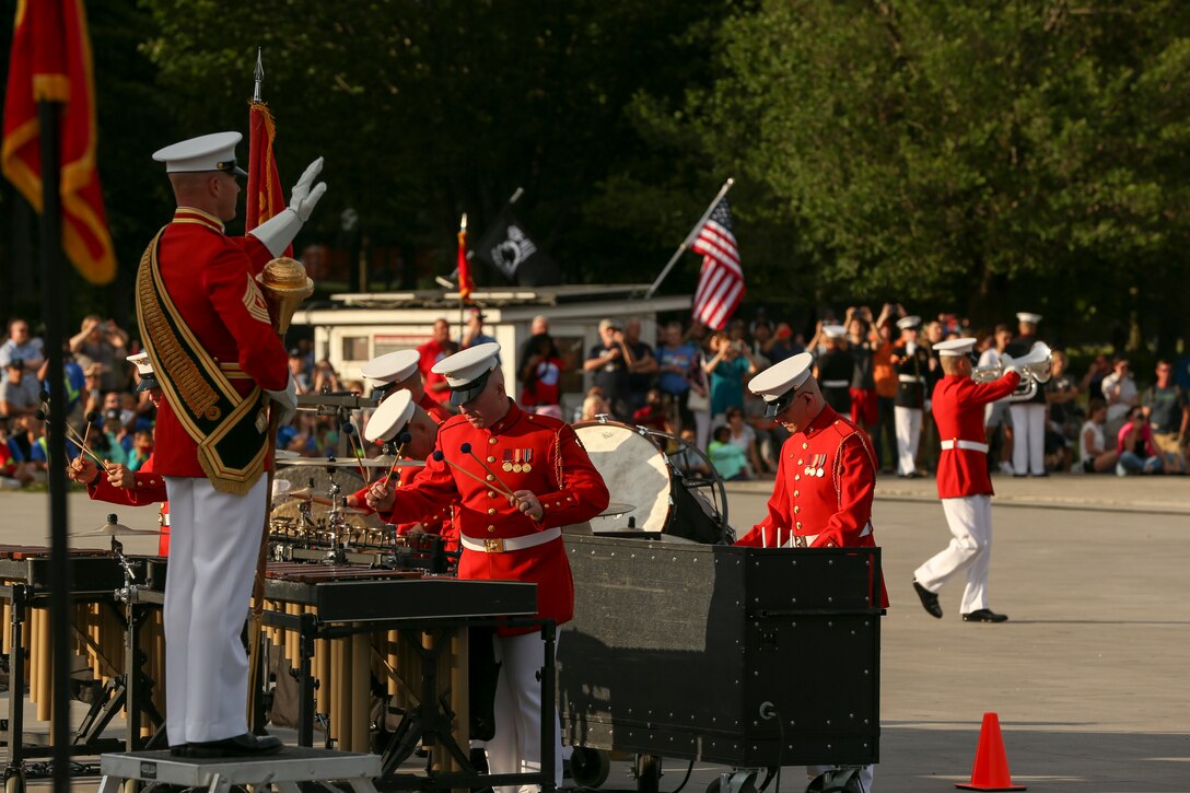 Marines with “The Commandant’s Own” United States Marine Drum and Bugle Corps perform during a Tuesday Sunset Parade at the Lincoln Memorial, Washington, D.C., June 11, 2019. The guest of honor for the evening was William P. Barr, attorney general, and the hosting official was Mr. Robert Hogue, counsel for the commandant of the Marine Corps. (U.S. Marine Corps photo by Pfc. Allen Sanders)