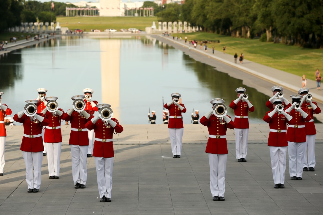 Marines with “The Commandant’s Own” United States Marine Drum and Bugle Corps perform during a Tuesday Sunset Parade at the Lincoln Memorial, Washington, D.C., June 11, 2019. The guest of honor for the evening was William P. Barr, attorney general, and the hosting official was Mr. Robert Hogue, counsel for the commandant of the Marine Corps. (U.S. Marine Corps photo by Pfc. Allen Sanders)