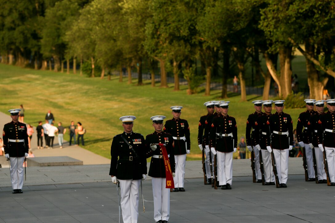 Marines with Bravo Company perform during a Tuesday Sunset Parade at the Lincoln Memorial, Washington, D.C., June 11, 2019. The guest of honor for the evening was William P. Barr, attorney general, and the hosting official was Mr. Robert Hogue, counsel for the commandant of the Marine Corps. (U.S. Marine Corps photo by Pfc. Allen Sanders)