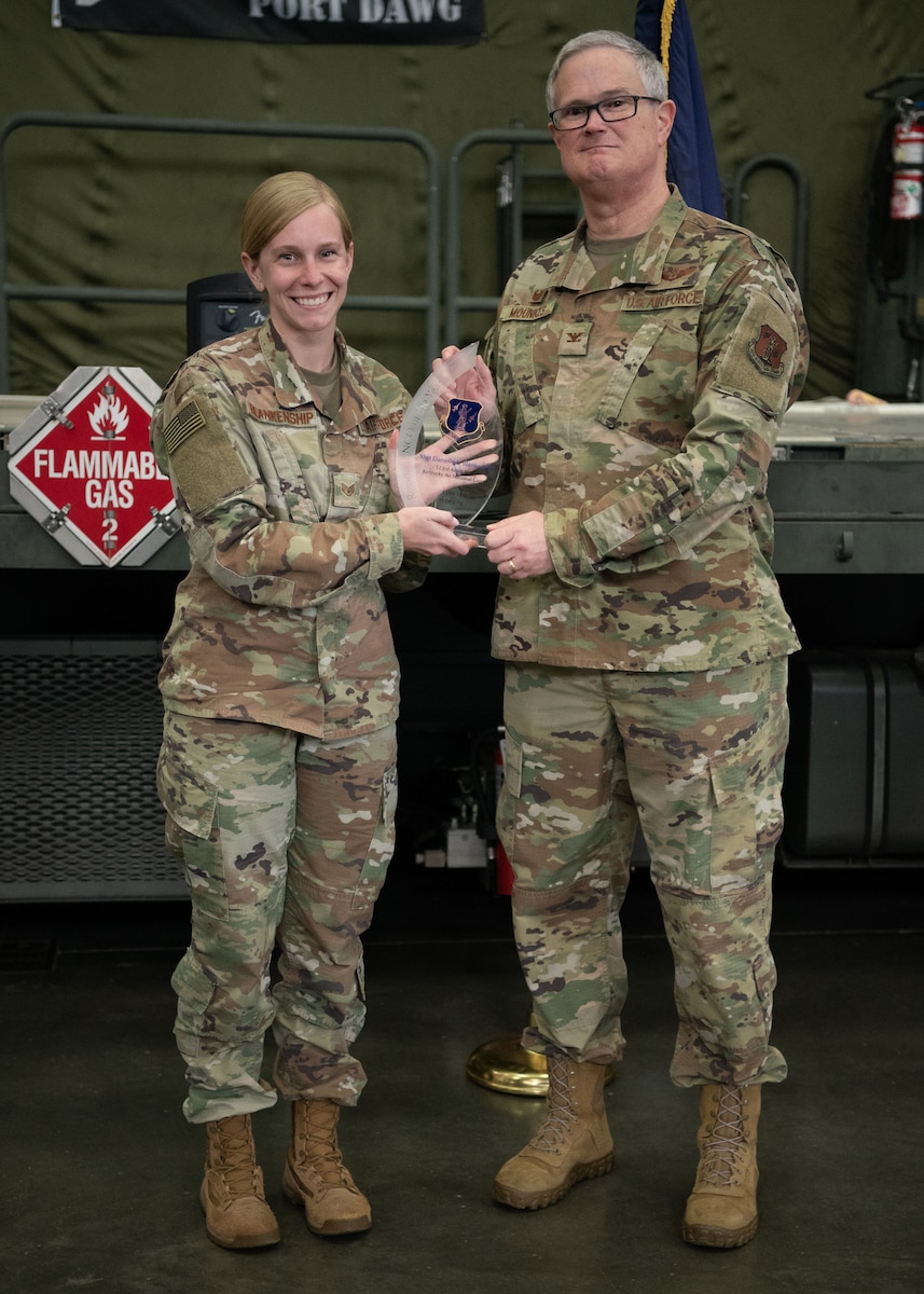 Col. David J. Mounkes, commander of the 123rd Airlift Wing, presents the 2019 Air National Guard Non-Commissioned Officer of the Year Region 3 Award to Staff Sgt. Danielle Blankenship during a ceremony held at the Kentucky Air National Guard Base in Louisville, Ky., May 19, 2019. Blankenship, a logistics plans journeyman for the 123rd Logistics Readiness Squadron, was chosen earlier this year as the Kentucky Guard’s Outstanding Airman of the Year in the non-commissioned officer category. (U.S. Air National Guard photo by Master Sgt. Vicky Spesard)