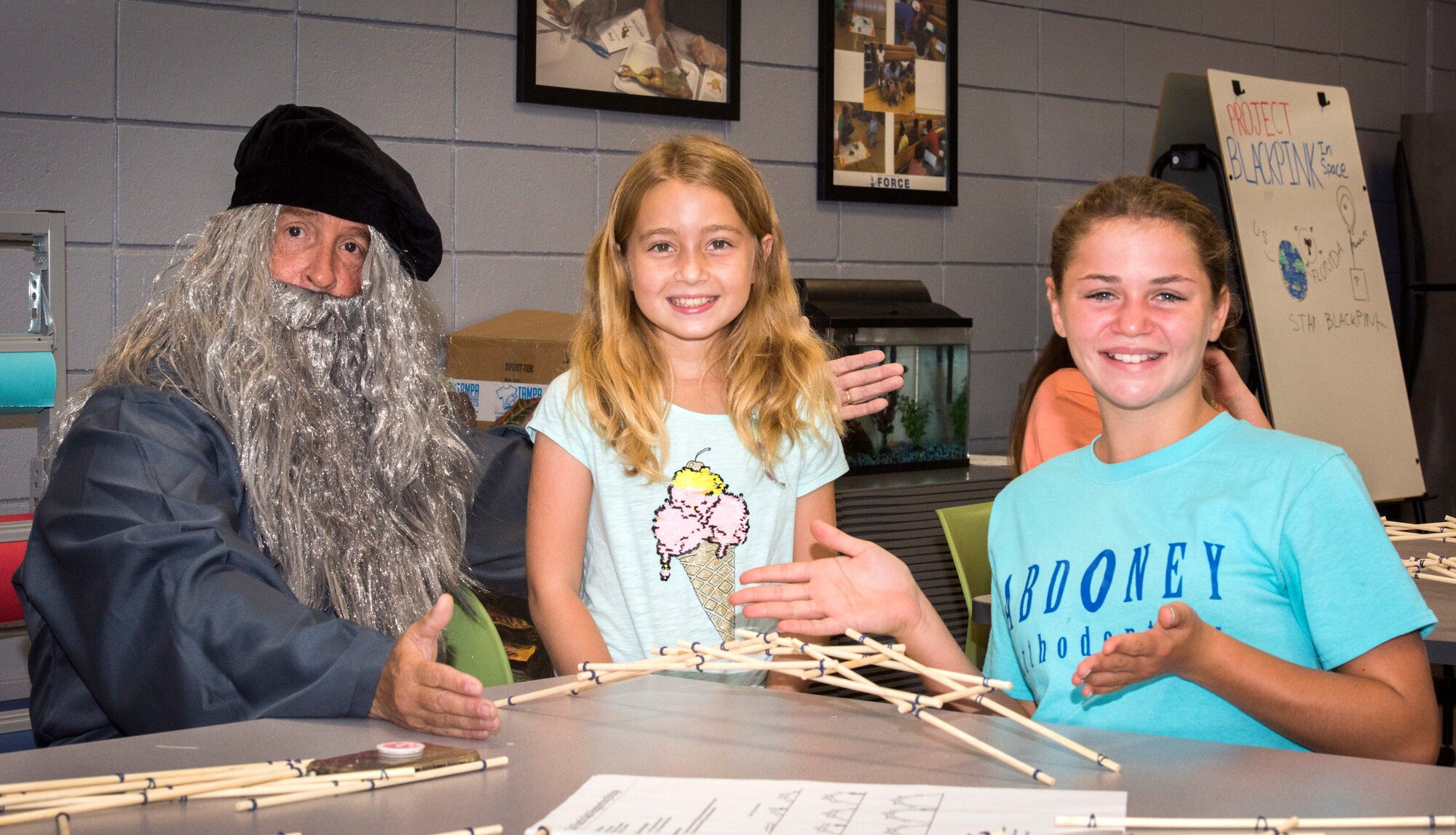 A Leonardo Da Vinci re-enactor visits the 6th Force Support Squadron Child Development Center students to build Da Vinci self-supporting bridges during a science, technology, engineering and mathematics camp at MacDill Air Force Base, Fla., June 11, 2019.