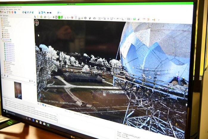 A scan with the overlaid digital photograph shows a 3-D model of a surveyed site. The survey section of 84th Radar Evaluation Squadron at Hill Air Force Base, Utah, recently received two 3-D terrestrial laser scanners for faster and more accurate surveys around radar sites. (U.S. Air Force photo by Cynthia Griggs)