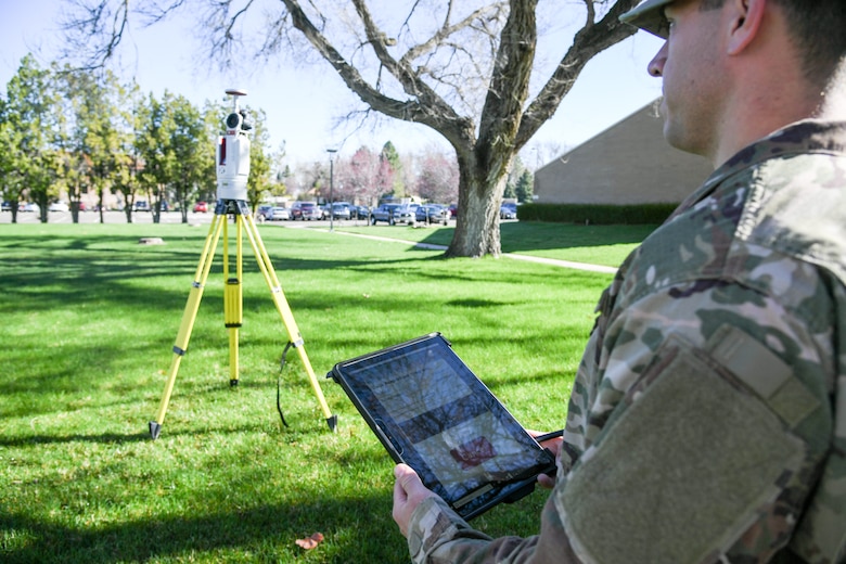 Staff Sgt. Ian Barone, 84th Radar Evaluation Squadron, demonstrates a 3-D terrestrial laser scanner April 17, 2019 at Hill Air Force Base, Utah. The survey section of the squadron recently received the new laser that provides faster and more accurate surveys around radar sites. (U.S. Air Force photo by Cynthia Griggs)