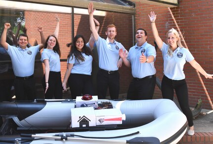 IMAGE: DAHLGREN (June 6, 2019) - The Naval Surface Warfare Center Dahlgren Division (NSWCDD) Sly Fox Mission 25 team members pictured with a Rigid Hull Inflatable Boat integrated with a hardware representation of PEGASUS – Power and Energy Generation Analysis SimUlation System. The team proved the potential of PEGASUS to integrate electric weapons and electric propulsion systems aboard Navy ships in several demonstrations held at NSWCDD. Left to right in the front row are Daniel Apolinar, Alexa Thomas, Marie Zacarias Morro, Joshua Hellerick, Peter Corrao and Courtney Fredrickson.