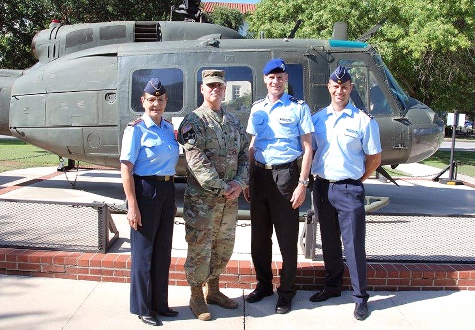 (From left) Maj. Gen. Gesine Kruger, commander for the German Bundeswehr Medical Academy, poses with Lt. Col. Larry Lindsey, Tactical Combat Medical Care Course director, Health Readiness Center of Excellence; Col. Kai Schlolaut, German Health Foreign Liaison Officer; and Lars Schmutzer, Adjutant, Academy Munich, during a visit to Joint Base San Antonio-Fort Sam Houston June 6.