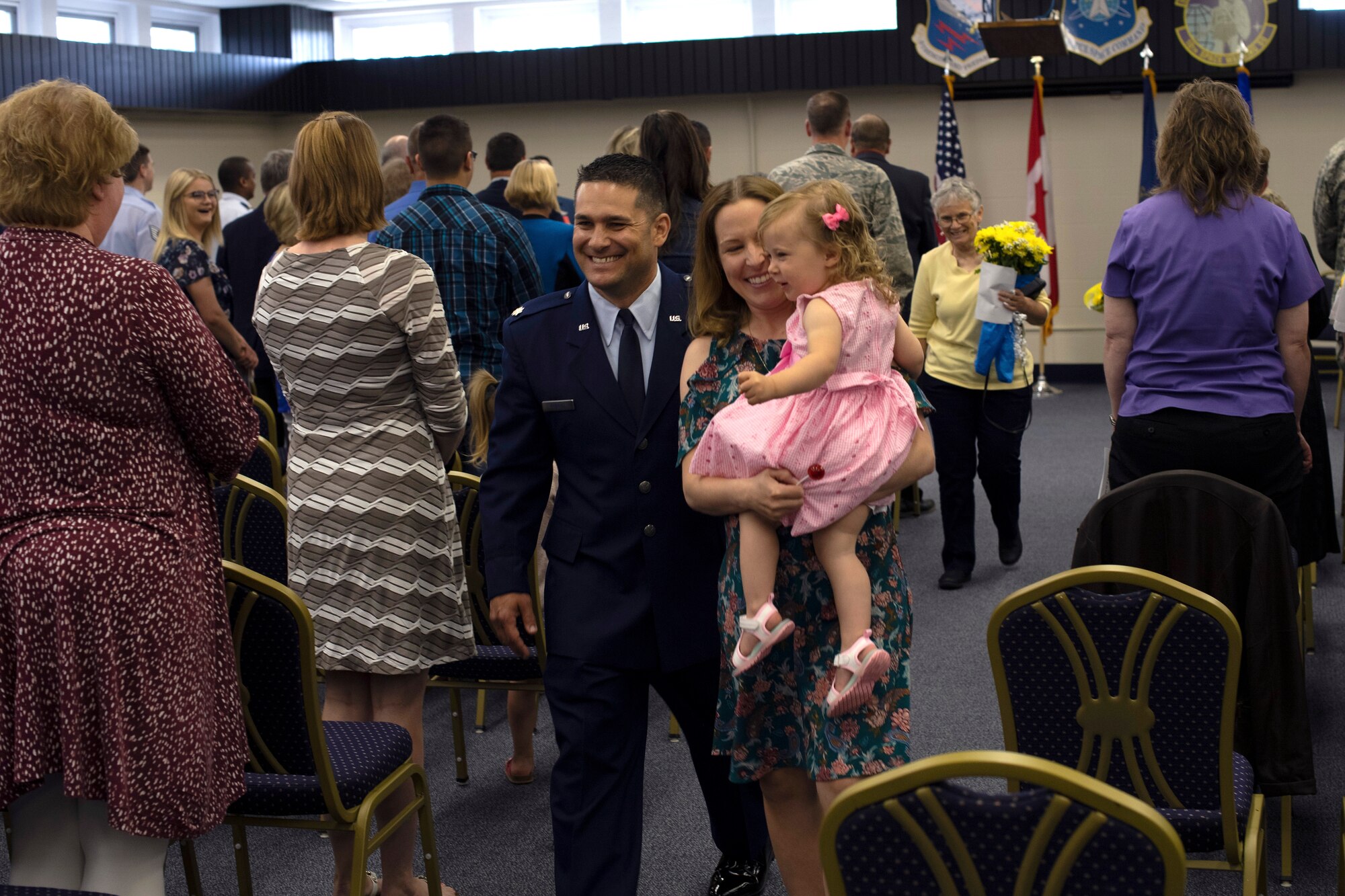 Lt. Col. Ryan Durand, 10th Space Warning Squadron commander, walks away from his change of command ceremony beside his wife and daughter June 11, 2019, on Cavalier Air Force Station, North Dakota. Durand assumed command of the northern-tier base from outgoing commander, Lt. Col. Stephen Hobbs. (U.S. Air Force photo by Senior Airman Elora J. Martinez)