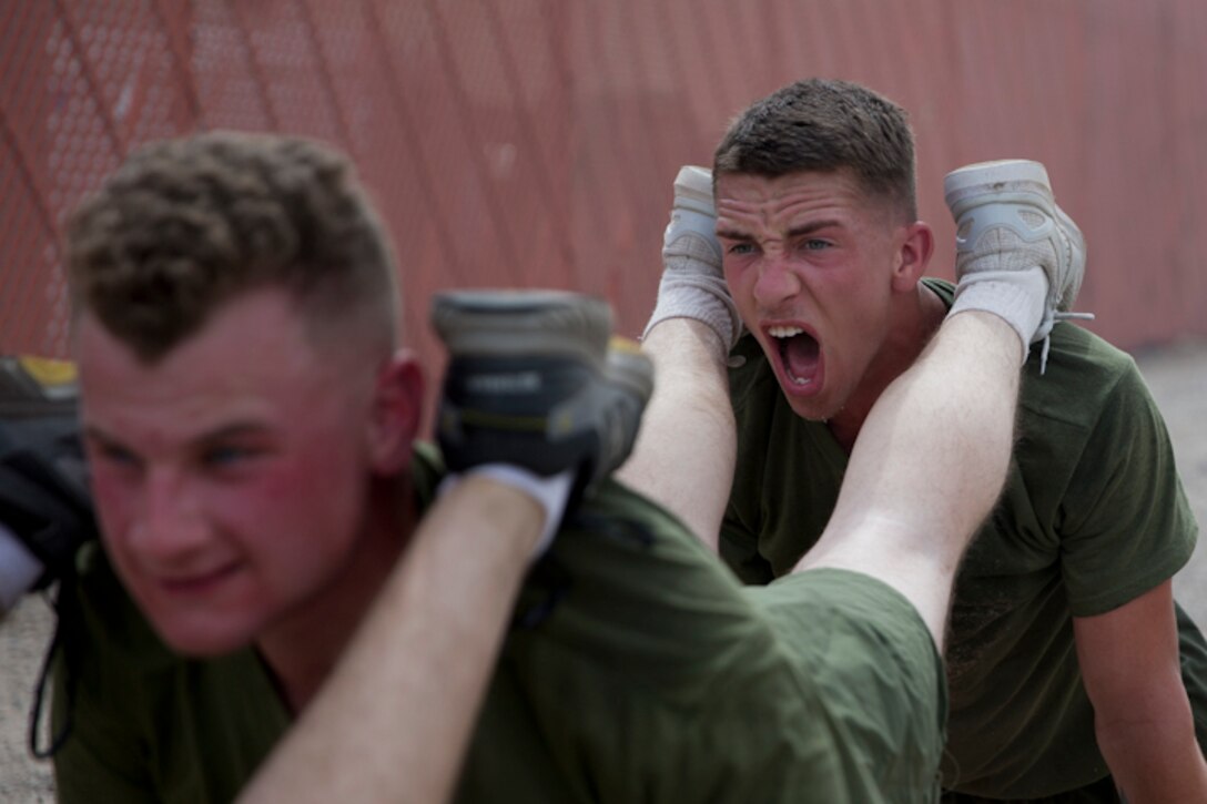 U.S. Marines with Communications Squadron 28, Marine Corps Air Station Cherry Point conduct physical training at Marine Corps Air Station Yuma Ariz., May 2, 2019. U.S. Marines stay in shape by training their bodies and minds during vigorous physical activities to ensure combat readiness at all times. (U.S. Marine Corps photo by Lance Cpl. Joel Soriano)