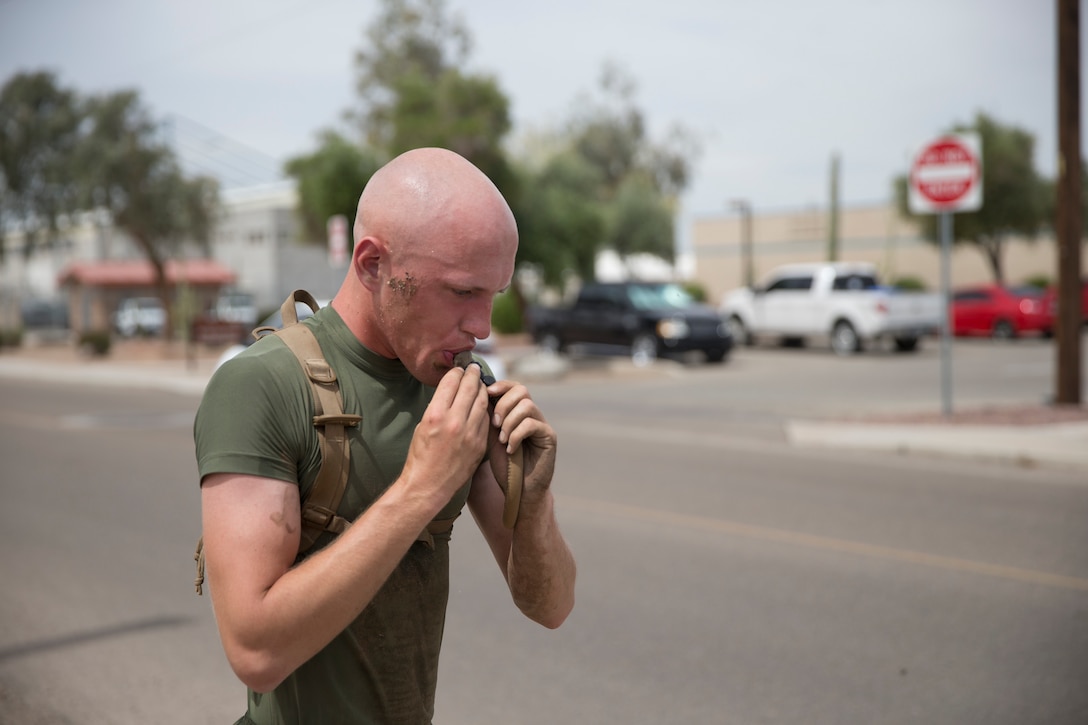 U.S. Marines with Communications Squadron 28, Marine Corps Air Station Cherry Point conduct physical training at Marine Corps Air Station Yuma Ariz., May 2, 2019. U.S. Marines stay in shape by training their bodies and minds during vigorous physical activities to ensure combat readiness at all times. (U.S. Marine Corps photo by Lance Cpl. Joel Soriano)