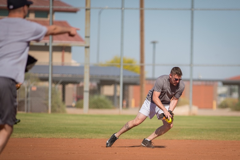 U.S. Marines attached to the Legal Service Support Detachment (LSSD) throughout Marine Corps Installations West (MCIWEST), participate in an annual softball tournament on Marine Corps Air Station Yuma, May 3, 2019. The MCIWEST tournament is held annually to build camaraderie throughout the West Coast LSSD. (U.S. Marine Corps photo by Sgt. Allison Lotz)