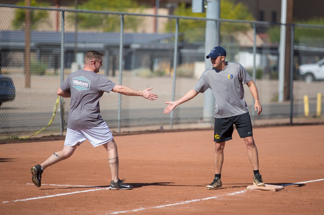 U.S. Marines attached to the Legal Service Support Detachment (LSSD) throughout Marine Corps Installations West (MCIWEST), participate in an annual softball tournament on Marine Corps Air Station Yuma, May 3, 2019. The MCIWEST tournament is held annually to build camaraderie throughout the West Coast LSSD. (U.S. Marine Corps photo by Sgt. Allison Lotz)