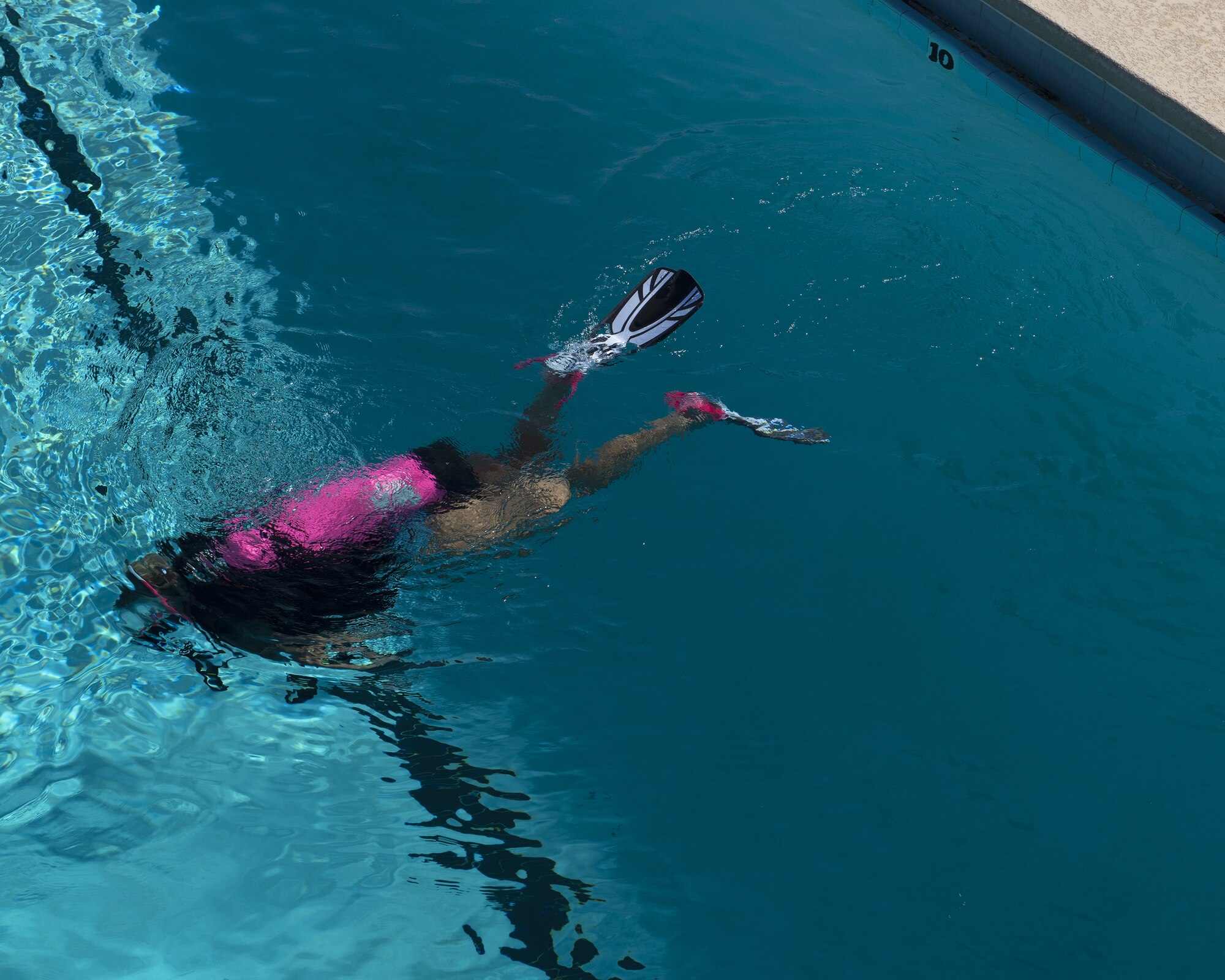 A scuba student practices diving June 8, 2019, at Luke Air Force Base, Ariz. Students were taught how diving can affect the body and what to do to combat it, such as how to equalize pressure and clear their ears.