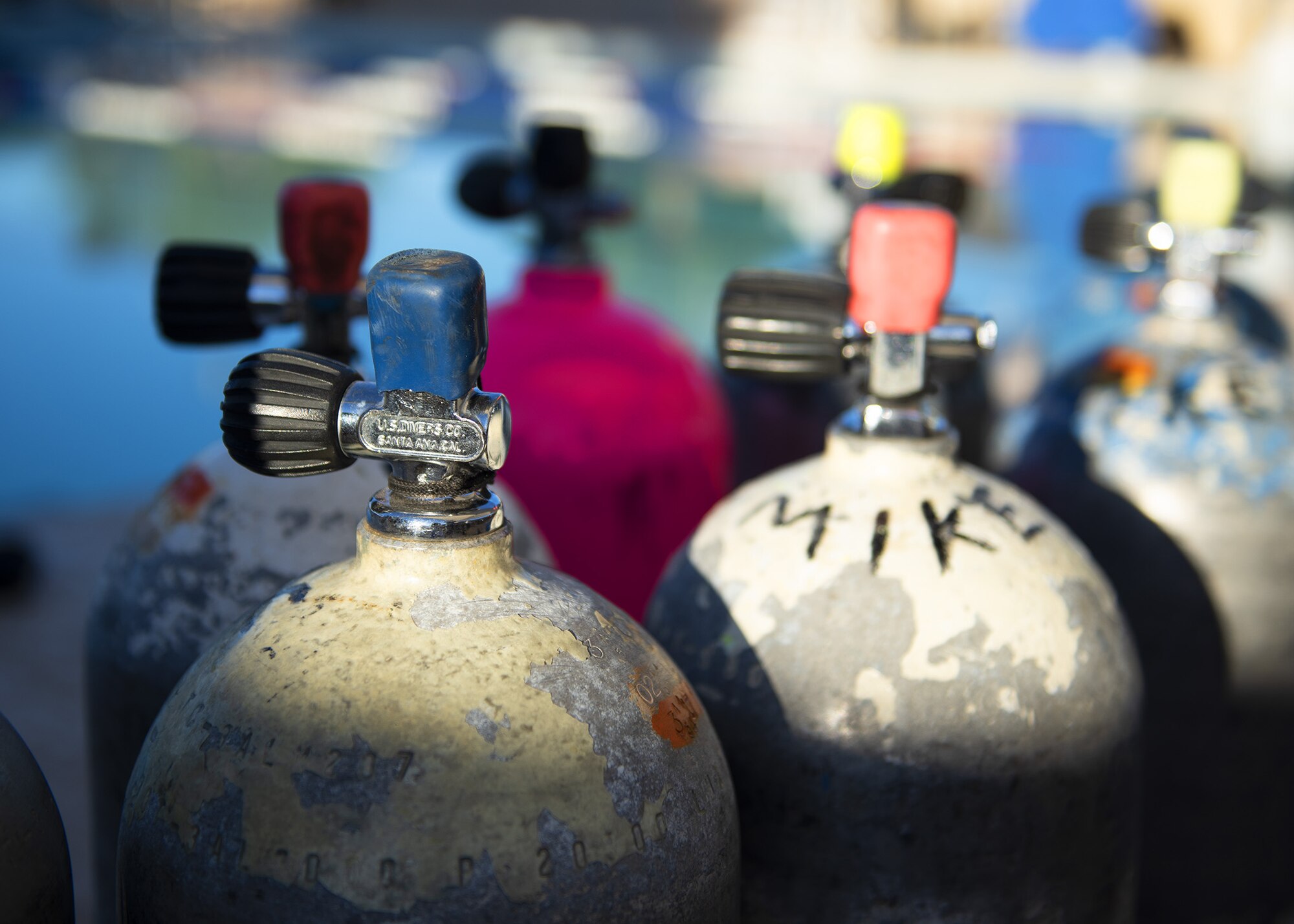 Scuba tanks sit by the pool June 8, 2019, at Luke Air Force Base, Ariz.