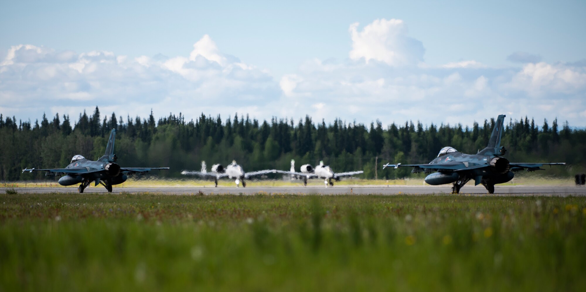 Japan Air Self-Defense Force F-2s from the 3rd Air Wing, Misawa Air Base, Japan, taxi down the runway at Eielson Air Force Base, Alaska, June 10, 2019. The 3rd Wing is participating in Red Flag-Alaska, a large-scale training exercise, with units and allied nations’ air forces from around the Pacific. (U.S. Air Force photo by Senior Airman Stefan Alvarez