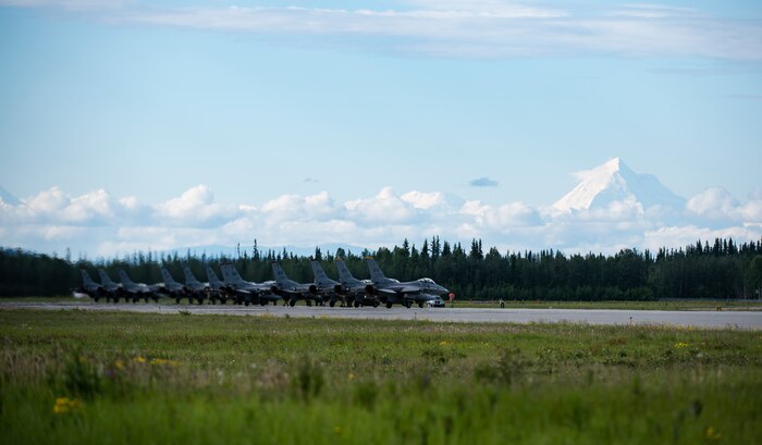 F-16 Fighting Falcons from the 13th Fighter Squadron, Misawa Air Base, Japan, the 35th and 80th Fighter Squadrons, Kunsan Air Base, Republic of Korea, perform pre-flight checks at Eielson Air Force Base, Alaska, June 10, 2019. The 13th FS and 35th FS “Pantons” are participating in Exercise Red Flag-Alaska 19-2, which allows units from around the Pacific to train in an air space roughly the size of Oklahoma. (U.S. Air Force photo by Senior Airman Stefan Alvarez)