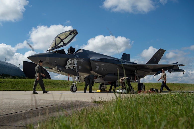 U.S. Air Force Airmen de-arm an F-35A Lightning II fighter aircraft, assigned to the 421st Fighter Squadron, Hill Air Force Base, Utah, on the flight line at Spangdahlem Air Base, Germany, June 11, 2019. Multiple F-35s came to the European theater as part of a Theater Security Package to conduct training with partner nation aircraft. (U.S. Air Force photo by Airman 1st Class Valerie Seelye)