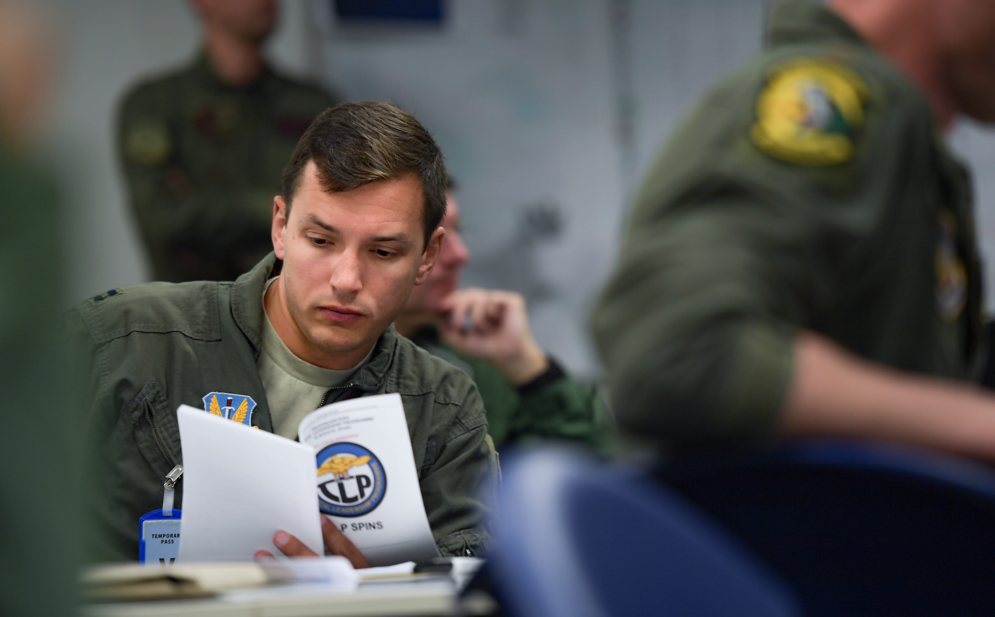 U.S. Air Force F-35A pilot reviews flight plans during a pre-flight brief.