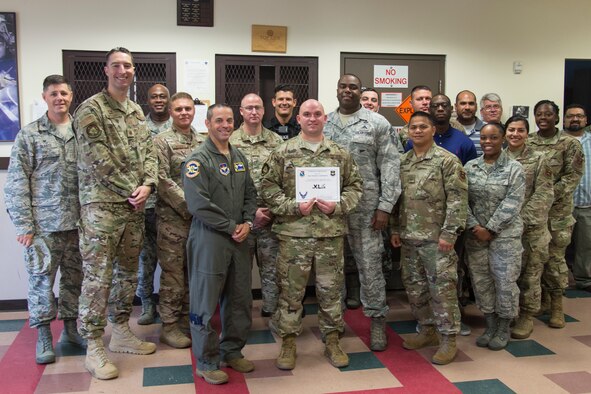 Staff Sgt. Timothy Loudenback, 47th Security Forces Squadron standards and evaluation NCO in charge, was chosen by wing leadership to be the “XLer” of the week, for the week of June 3, 2019, at Laughlin Air Force Base, Texas. The “XLer” award, presented by Col. Lee Gentile, 47th Flying Training Wing commander, and Chief Master Sgt. Robert Zackery III, 47th Flying Training Wing command chief master sergeant, is given to those who consistently make outstanding contributions to their unit and the Laughlin mission. (U.S. Air Force photo by Senior Airman Daniel Hambor)