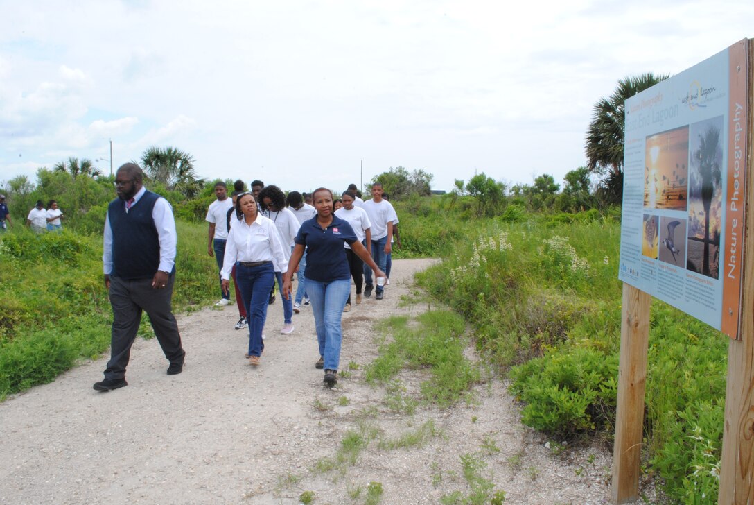 GALVESTON, Texas (June 12, 2019) – U.S. Army Corps of Engineers Galveston District’s Dr. Quentin Stubbs, regulatory specialist, and Dr. Rose Caballero, equal opportunity officer, conduct a field trip with Texas Southern University Maritime Program students on East Beach to discuss the importance of the wetlands. This field trip is part of the district’s Science, Technology, Engineering and Math Outreach Program.