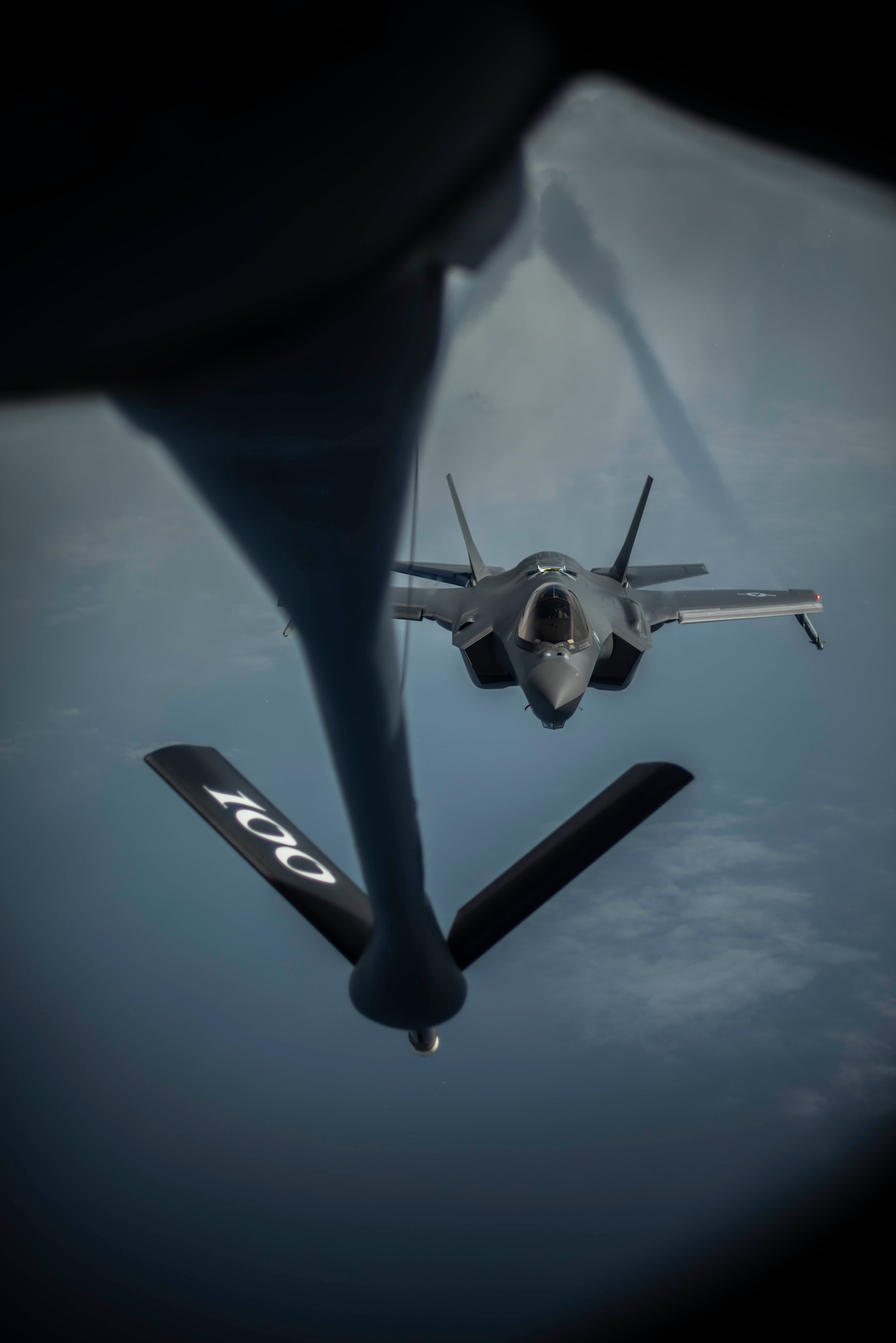 A U.S. Air Force F-35 Lightning II flies behind a U.S. Air Force KC-135 Stratotanker before conducting air refueling training for a Theater Security Package over the Mediterranean Sea, June 11, 2019. A Theater Security Package is a rotational force the Air Force deploys in order to conduct training, enhance readiness and interoperability, assure allies, deter adversaries, and demonstrate commitment to the region. (U.S. Air Force photo by Senior Airman Luke Milano)