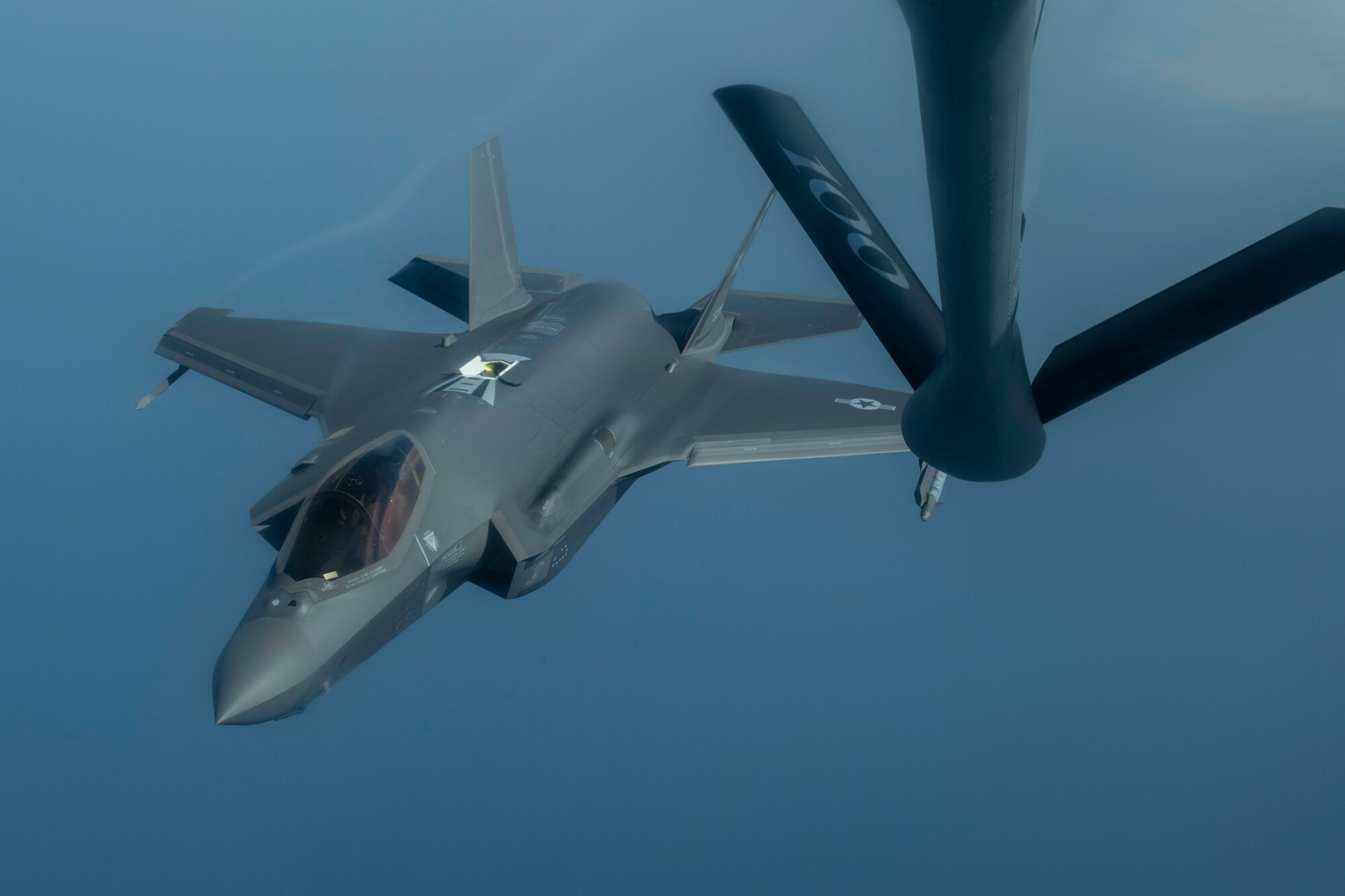 A U.S. Air Force F-35 Lightning II flies behind a U.S. Air Force KC-135 Stratotanker before conducting air refueling training for a Theater Security Package over the Mediterranean Sea, June 11, 2019. A Theater Security Package is a rotational force the Air Force deploys in order to conduct training, enhance readiness and interoperability, assure allies, deter adversaries, and demonstrate commitment to the region. (U.S. Air Force photo by Senior Airman Luke Milano)