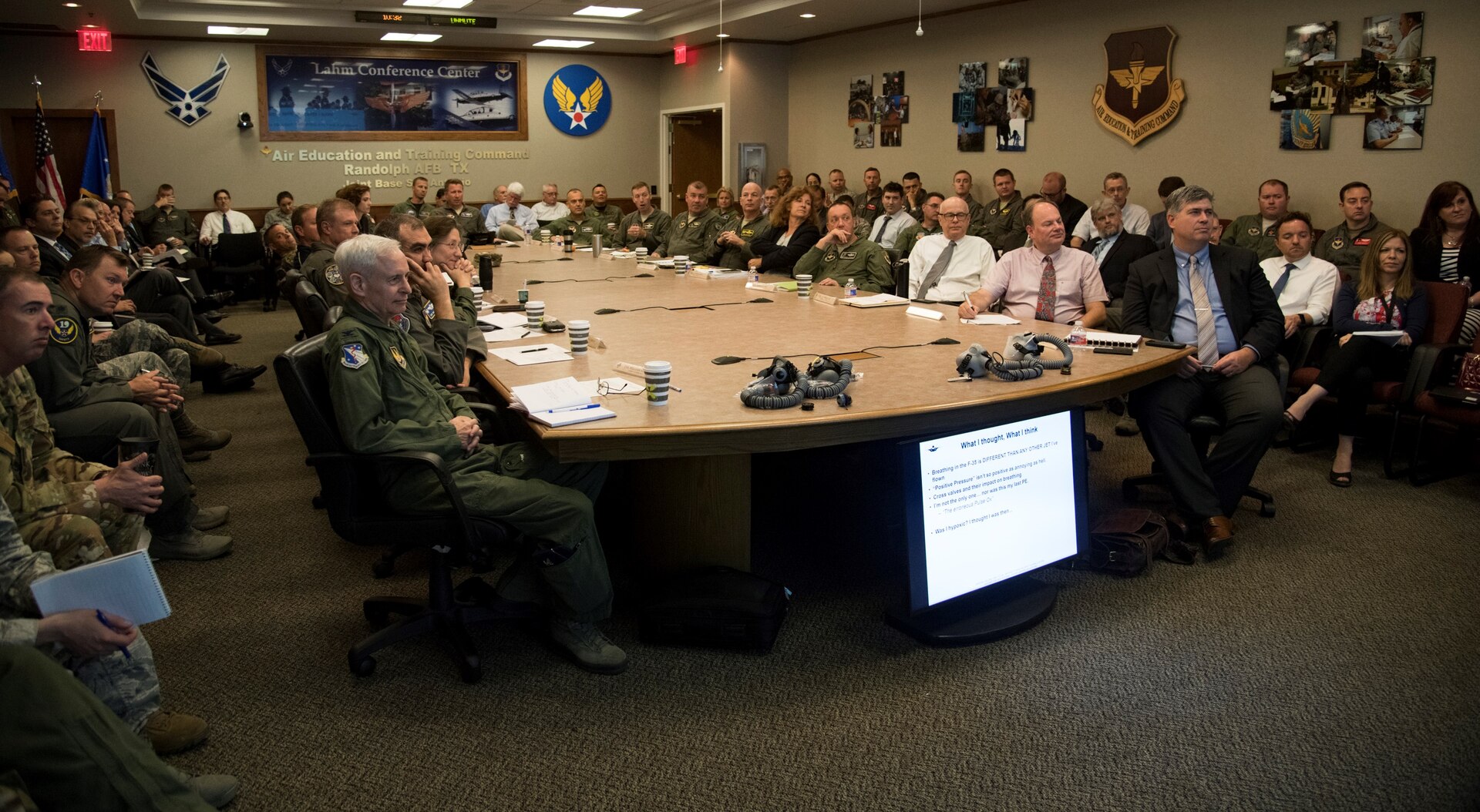 Attendees from both in and outside the Department of Defense listen to a briefing on the T-6 On-Board Oxygen Generating Systems, or OBOGS, during a conference at Joint Base San Antonio-Randolph May 29-30. During the conference, machine and human aspects of the problem were discussed, as well as the human-machine interface as part of the on-going effort to improve the safety of the OBOGS.