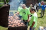 veterans enjoy a barbecue meal