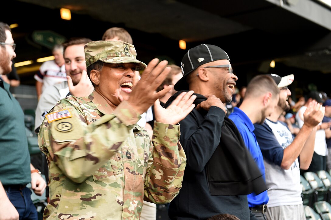 Master Sgt. Shandrel Daniels cheers during the Chicago White Sox vs Washington Nationals game at Guaranteed Rate Field, June 11, 2019.