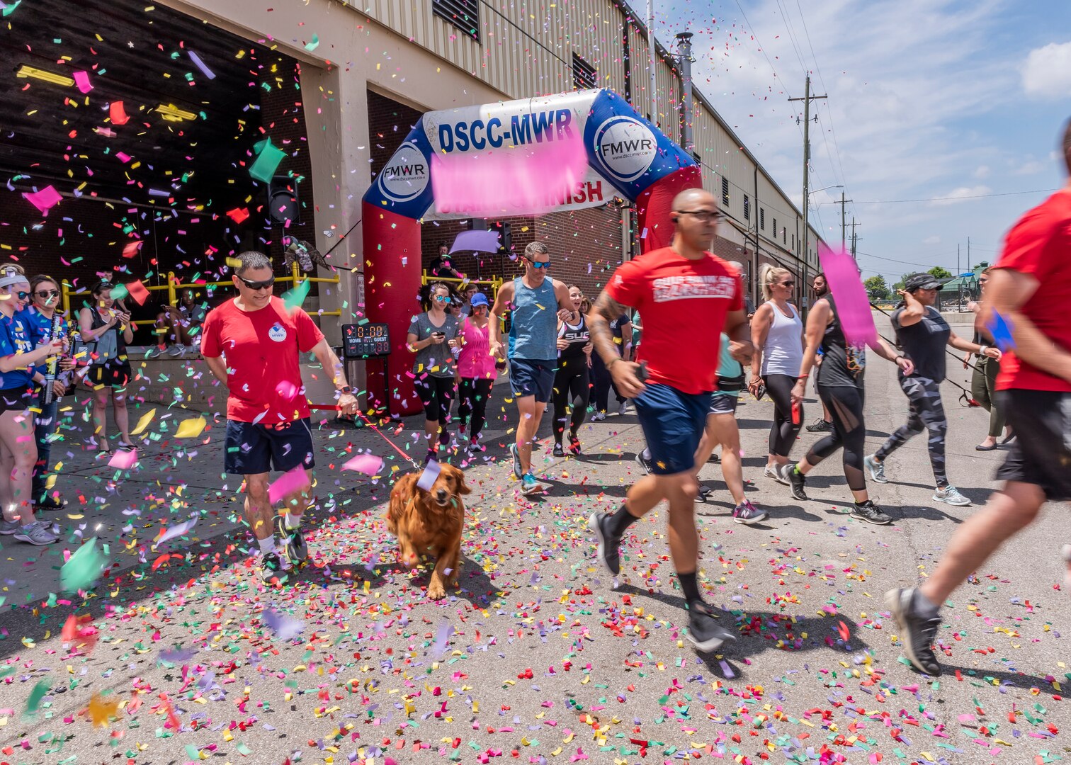 associates run through confetti