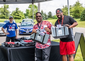 two associates receive promo bags