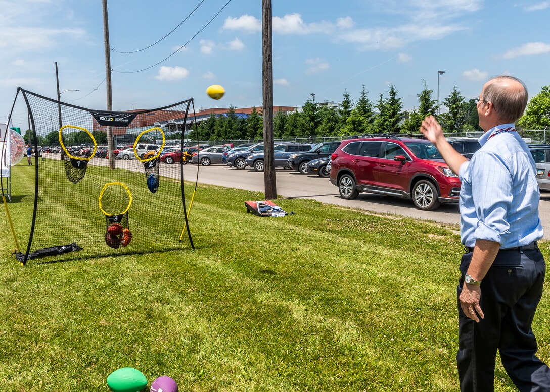 associate plays a toss game