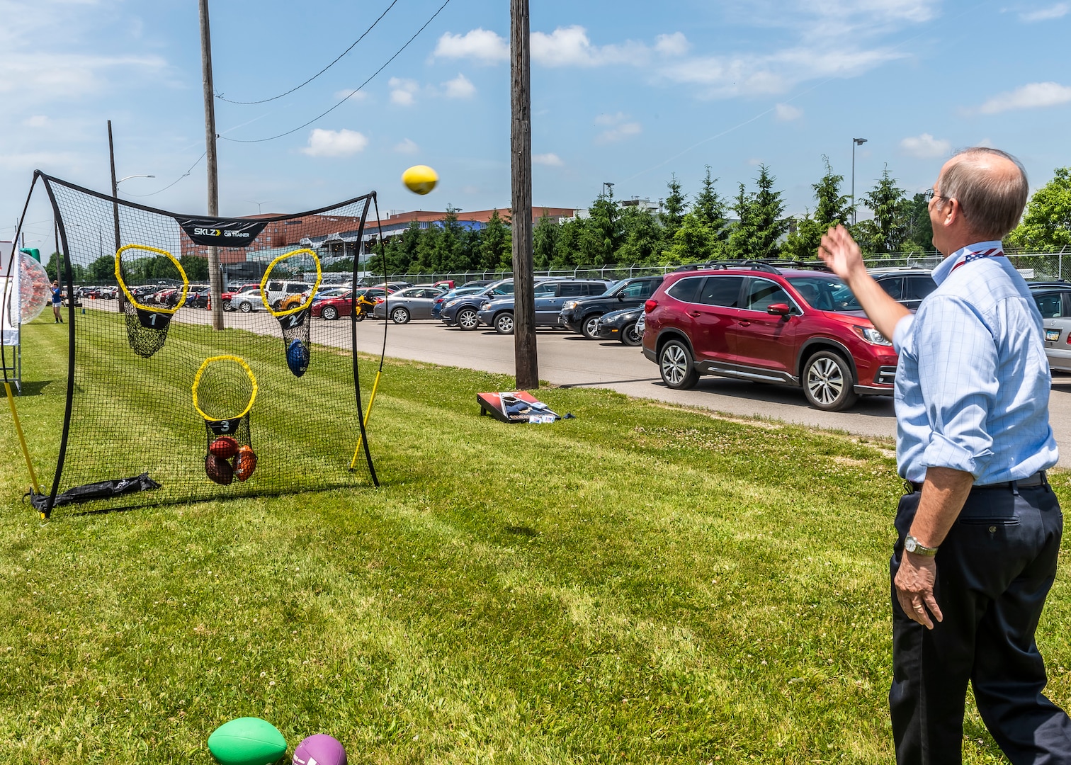 associate plays a toss game