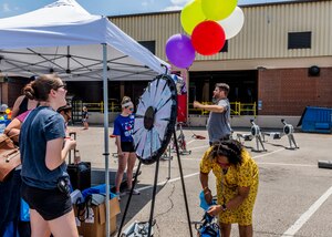 associate spins prize wheel