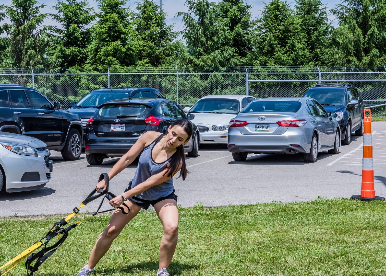 woman pulling exercise equipment