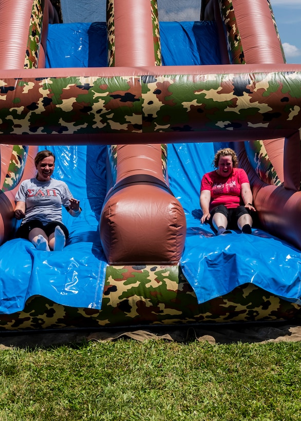 two women sliding