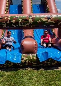 two women sliding