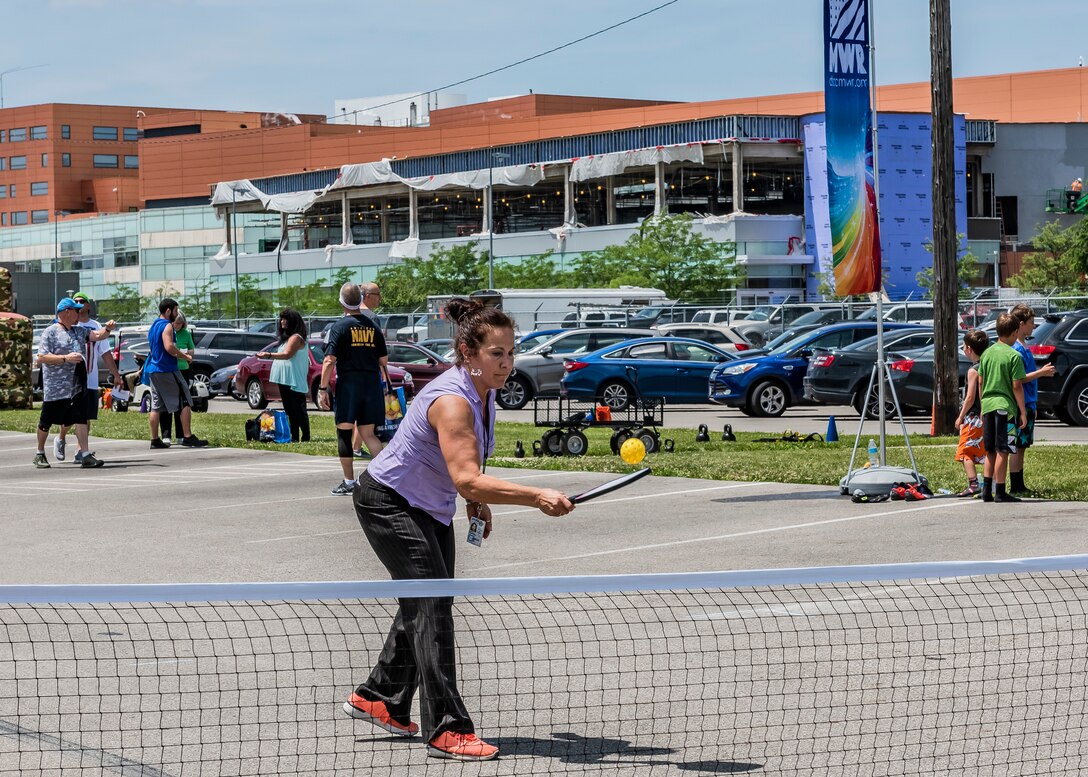 Woman plays tennis