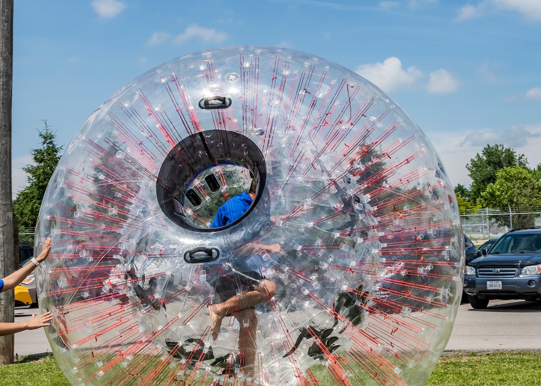 Person in a clear plastic ball