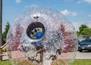 Person in a clear plastic ball
