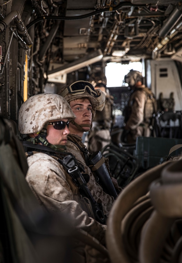U.S. Marines with Aircraft Operations Company, Marine Wing Support Squadron 472, Marine Aircraft Group 49, 4th Marine Aircraft Wing prepare for the take-off of a CH-53 Super Stallion during Integrated Training Exercise 4-19 at Marine Corps Air Ground Combat Center Twentynine Palms, Calif., June 10, 2019. ITX measures the ability to provide a cohesive, trained and ready capability in support of service and Combatant Commander requirements. (U.S. Marine Corps photo by Cpl. Tessa D. Watts)