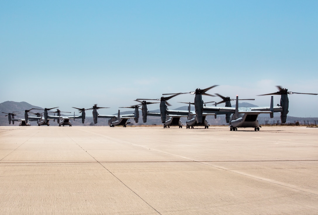 MV-22B Ospreys with Marine Medium Tiltrotor Squadron (VMM) 764, 4th Marine Aircraft Wing, lineup on the flight line before taking off from Marine Corps Air Station Miramar, Calif., June 12. Once a year reserve components of the Marine Corps go on two-week annual training detachments to sharpen their skills in their military occupational specialties. (U.S. Marine Corps photo by Sgt. Becky Cleveland)