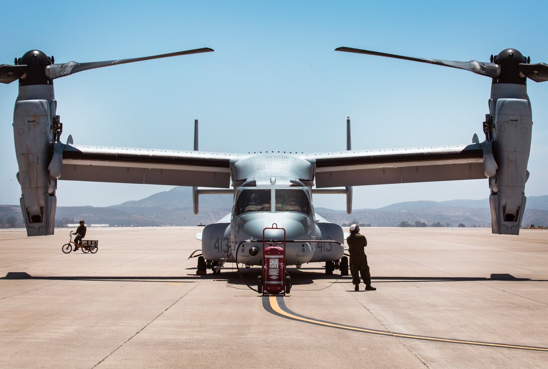An MV-22B Osprey with Marine Medium Tiltrotor Squadron (VMM) 764, 4th Marine Aircraft Wing, waits on the flight line before taking off from Marine Corps Air Station Miramar, Calif., June 12. Once a year reserve components of the Marine Corps go on two-week annual training detachments to sharpen their skills in their military occupational specialties. (U.S. Marine Corps photo by Sgt. Becky Cleveland)